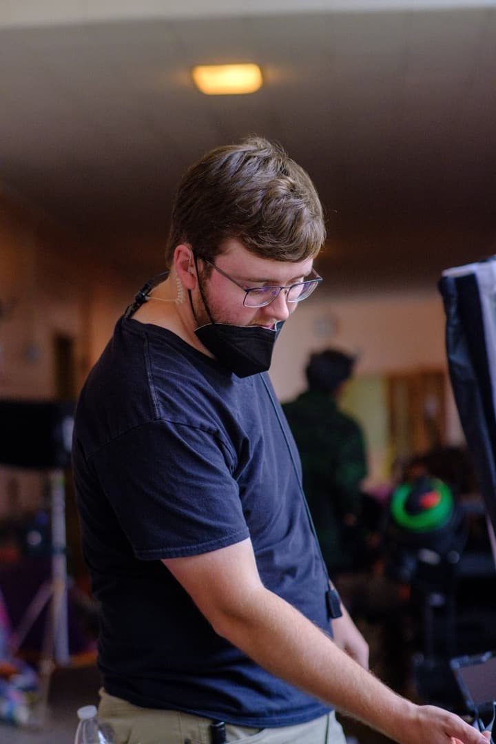 Behind the scenes photo 78 from Clone Cops production showing best boy electric jarrett jarvis on set of clone cops